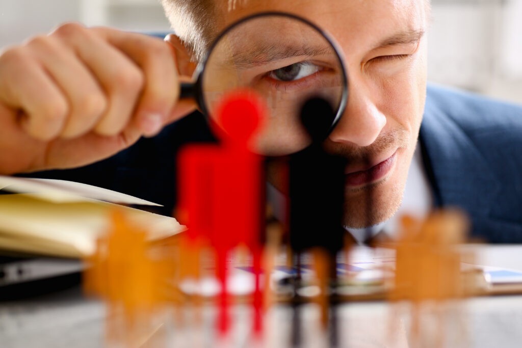 Man with magnifying glass