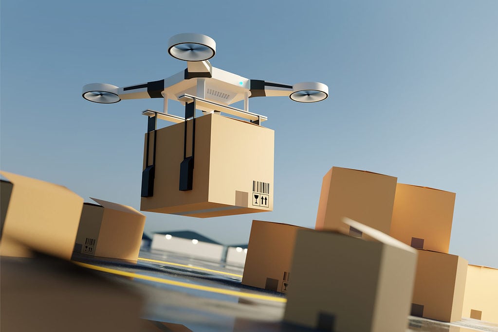 a,drone,lifting,off,the,ground,carrying,a,large,parcel.